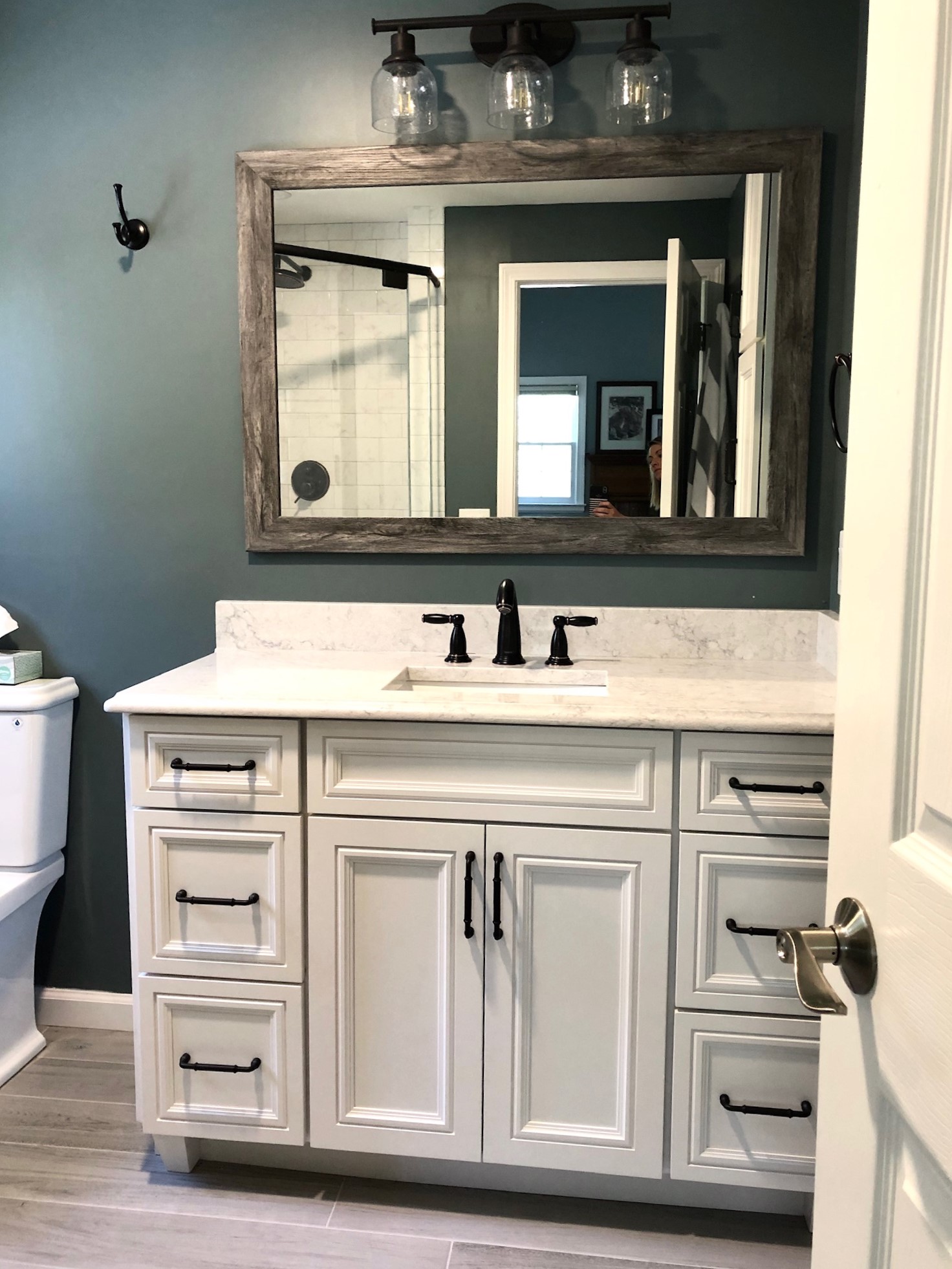 Large Vanity with Cabinets Open Bathroom